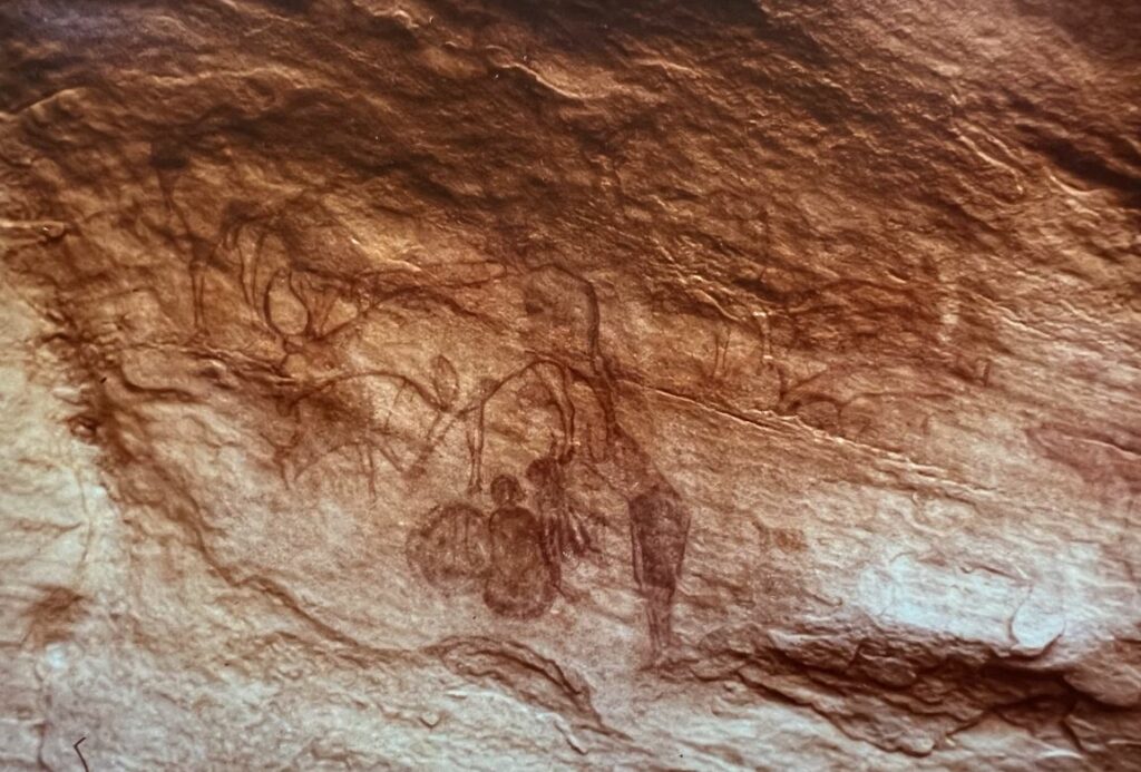 People and deer rock painting in Tassili n'Ajjer